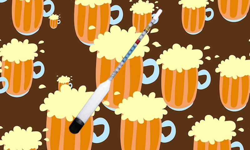 hydrometer op een achtergrond van bier